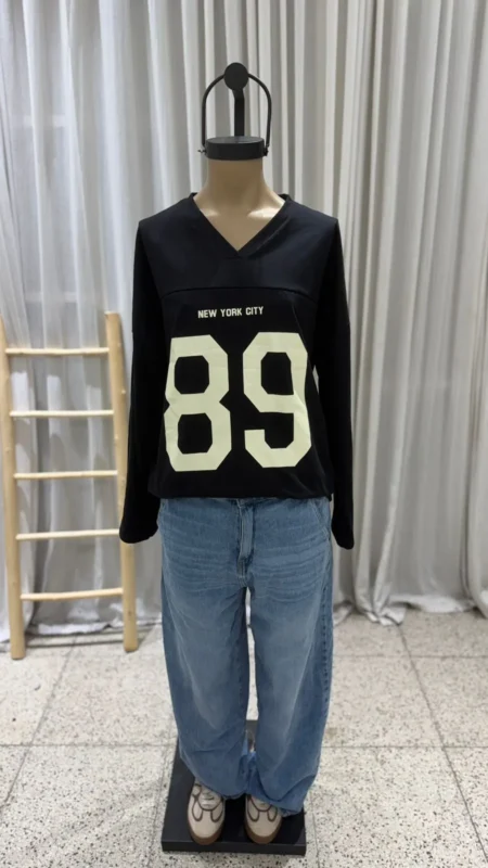 26/R23 - REMERA M/L CUELLO V"89" - JERSEY